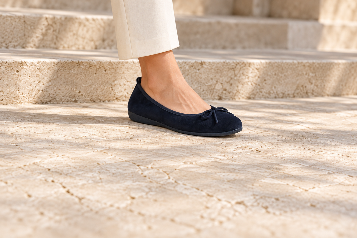 Navy La Ballerina BASIC suede ballet flat without an instep strap, worn on the foot